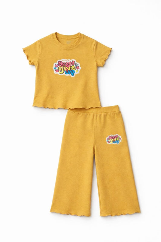 Girls Mustard Yellow “Never Give Up” Co-Ord Set – Ribbed Top & Flared Pants
